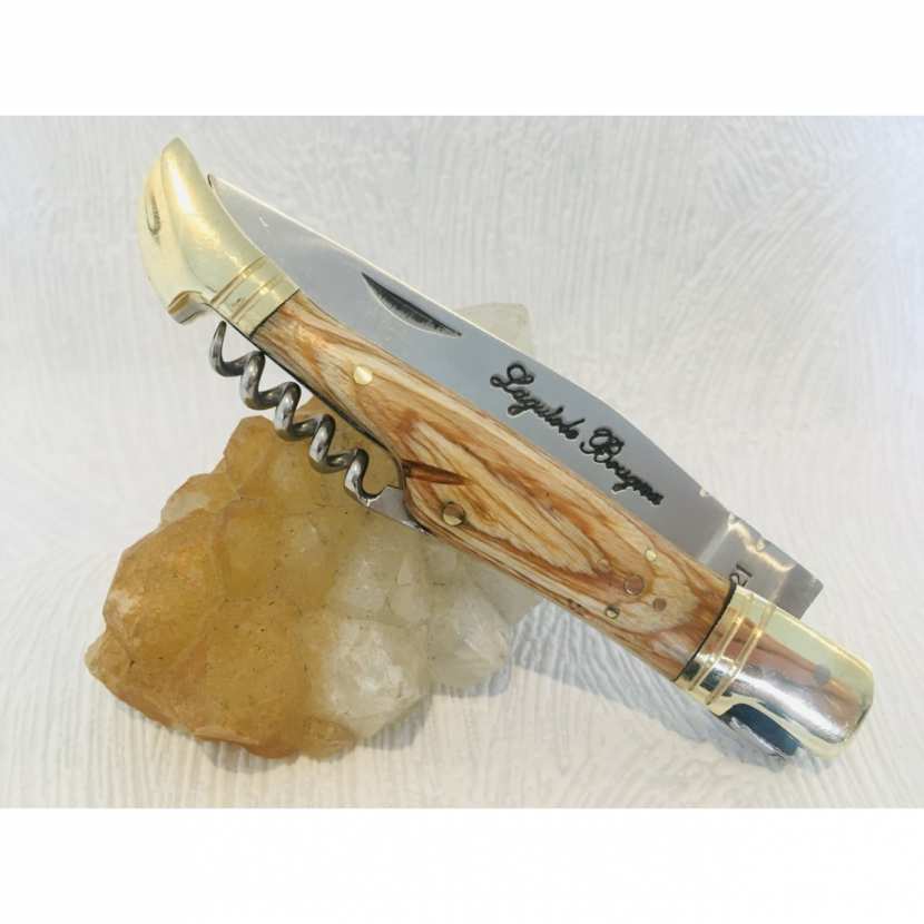 Couteau de poche LAGUIOLE TB avec son manche en bois claire et mitre laiton. 